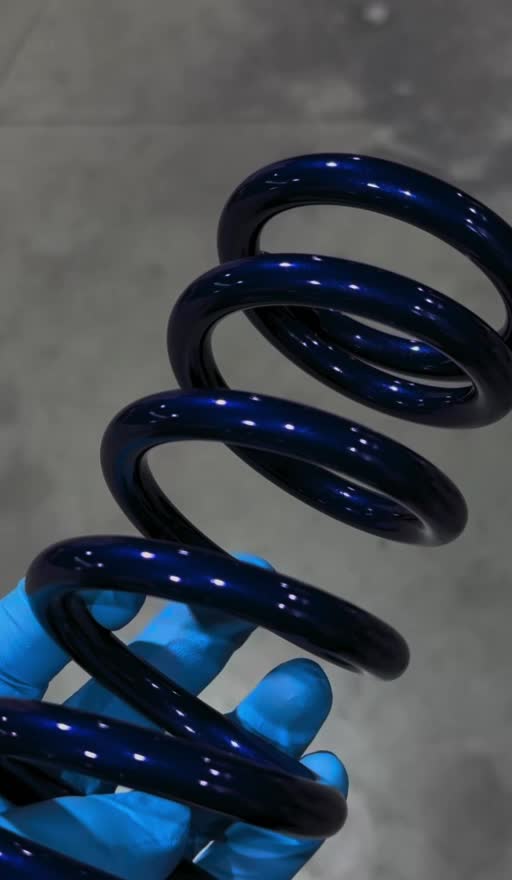 Ressort bleu après peinture électrostatique
